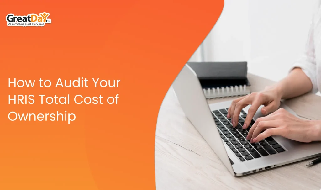 HR manager analyzing HRIS total cost of ownership using dashboards, payroll reports, and financial metrics.