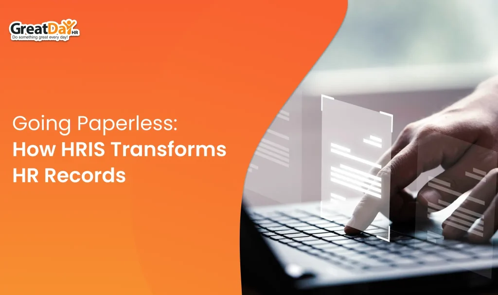 HR professionals using a digital HRIS platform to manage employee records and paperless HR documents.